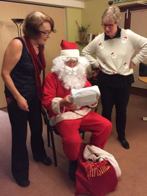 Father Christmas handing out goodies at the 2016 Xmas Party